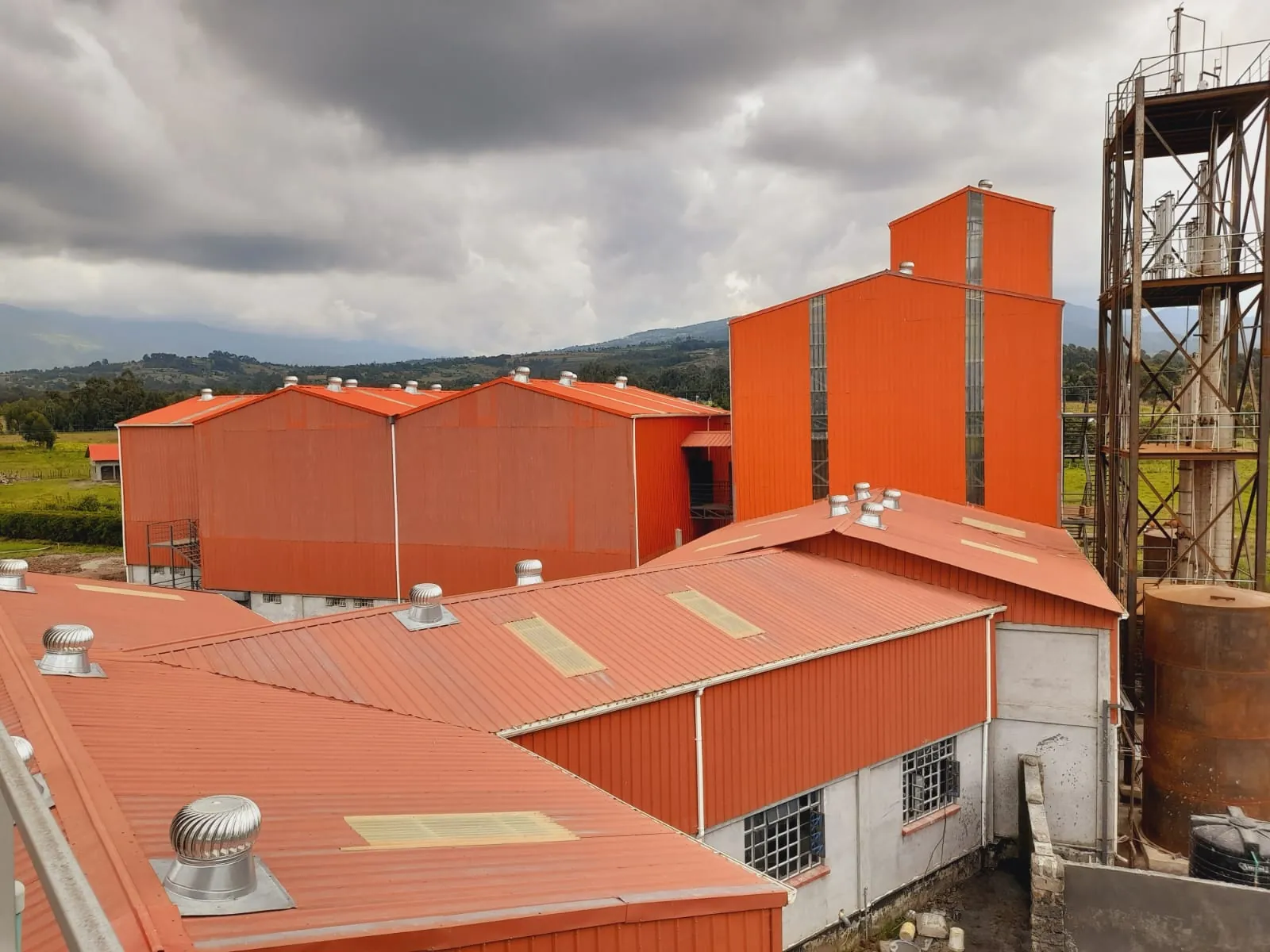 Orange processing halls and tower at the Ranges Sugar factory